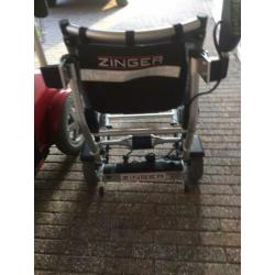 Zinger elektrische rolstoel met loopkit.