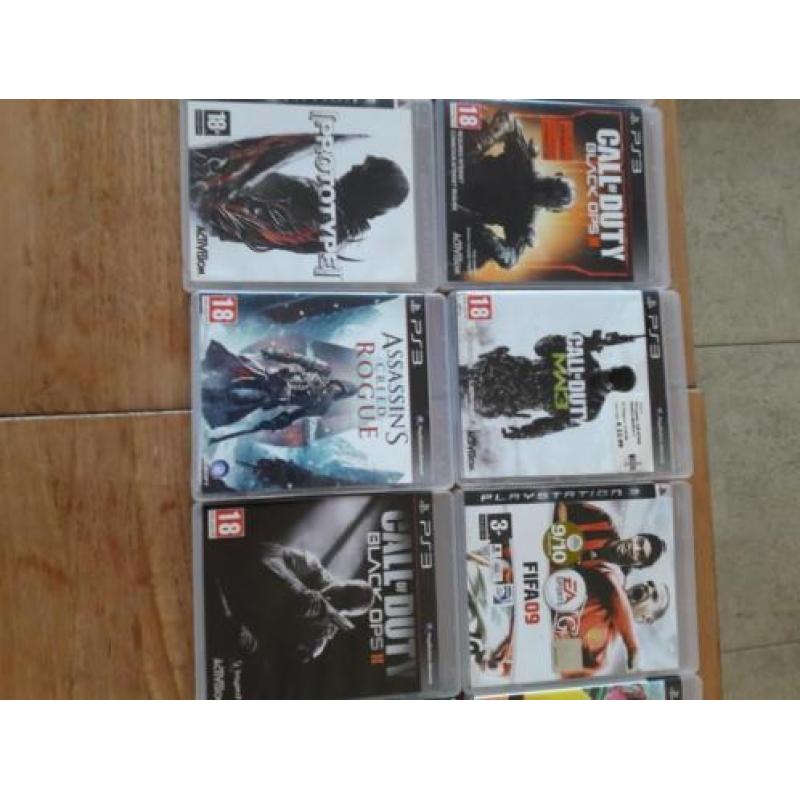 PS3 + 2 Controllers + Games